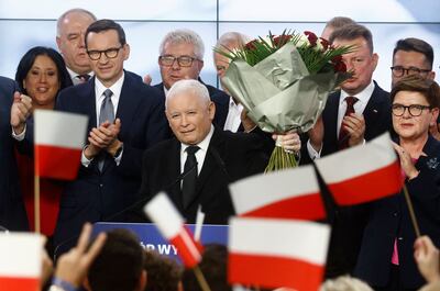 The ruling party of Polish Prime Minister Mateusz Morawiecki, left, and leader Jaroslaw Kaczynski, centre, was set to lose its majority on Monday. AFP 