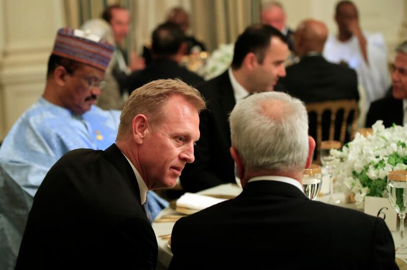 Acting Secretary of Defense Patrick Shanahan joins an iftar dinner, which breaks a daylong fast, celebrating Islam's holy month of Ramadan, in the State Dining Room of the White House in Washington, Monday, May 13, 2019. (AP Photo/Manuel Balce Ceneta)