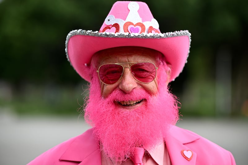 A spectator arrives dressed in pink on Jane McGrath Day, day three of the Third Test match between Australia and Pakistan at the Sydney Cricket Ground in Australia, which raises funds for a breast cancer charity. EPA