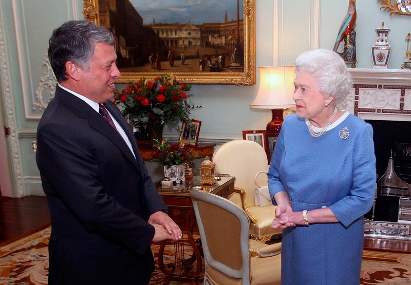 Queen Elizabeth II with Jordan's King Abdullah II at Buckingham Palace in London on November 15, 2011.  AP