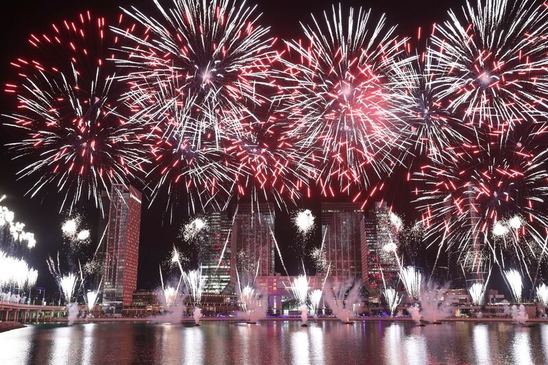 Spectacular fireworks display at the stroke of midnight ring in the New Year 2022 on Al Maryah Island, Abu Dhabi. Khushnum Bhandari / The National