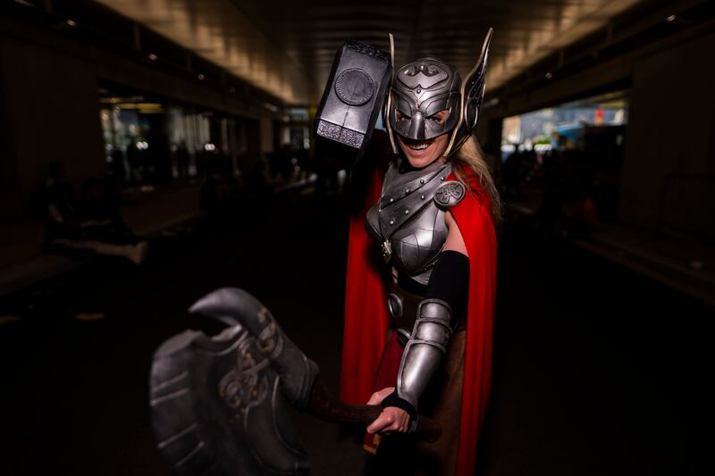 A Thor cosplayer poses during New York Comic Con. Charles Sykes / Invision / AP