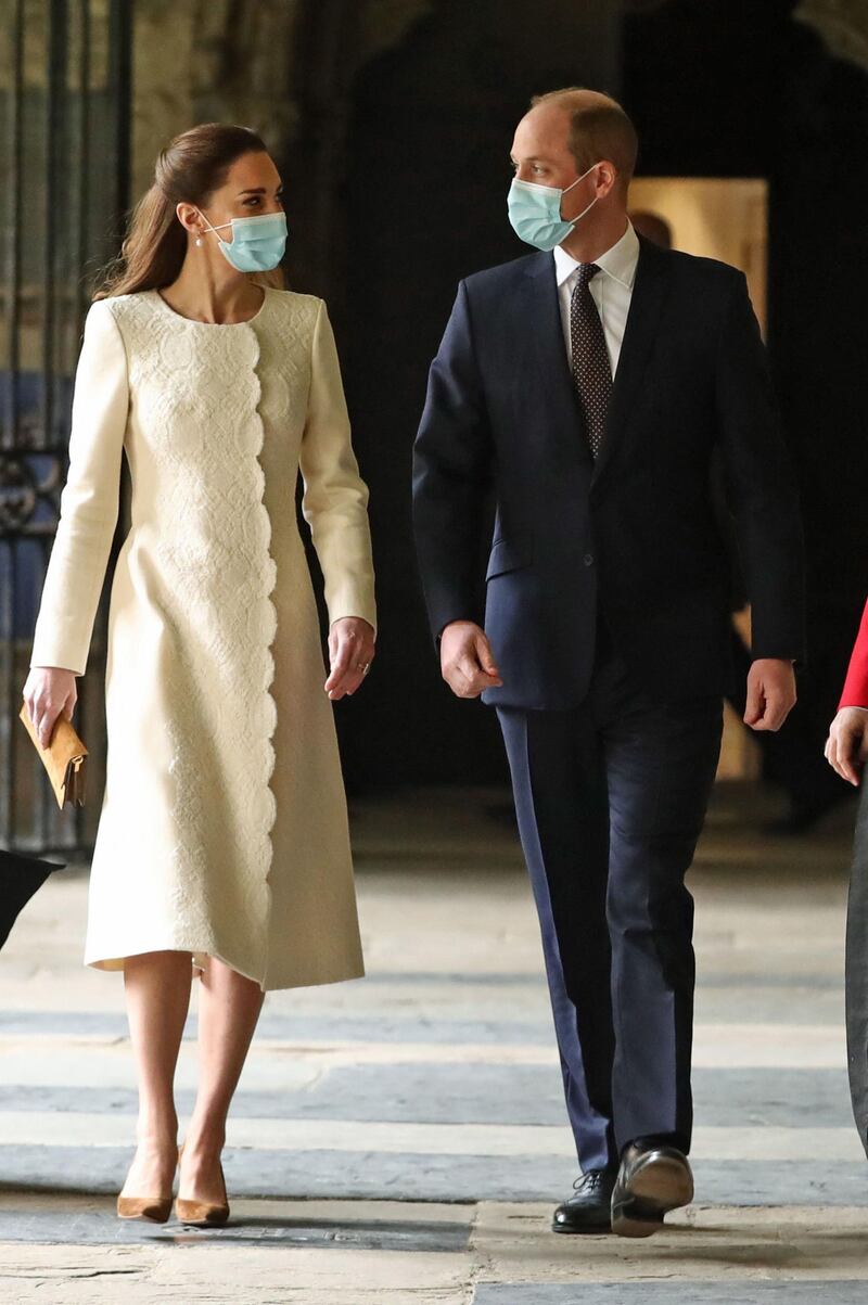 Britain's Prince William, Duke of Cambridge and Britain's Catherine, Duchess of Cambridge arrive for a visit to the coronavirus vaccination centre at Westminster Abbey, central London on March 23, 2021, to pay tribute to the efforts of those involved in the Covid-19 vaccine rollout.  / AFP / POOL / Aaron Chown
