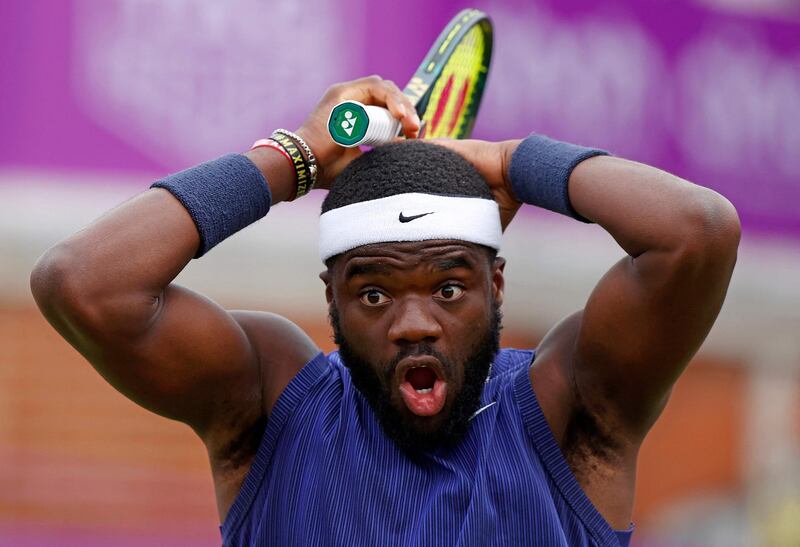 US player Frances Tiafoe after playing a shot into the net during his defeat against Canada's Denis Shapovalov Queen's Club Championship quarter-finals, in west London on Friday, June 19. AFP