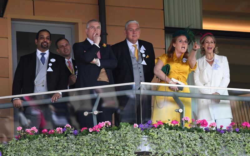 Sarah Ferguson, second right, and ex-husband Prince Andrew watch a race during day four of Royal Ascot. EPA