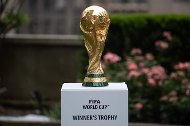 The FIFA World Cup trophy is displayed during an event in New York after an announcement related to the staging of the FIFA World Cup 2026, on June 16, 2022.  - Mexico City's iconic Azteca Stadium and the Los Angeles Rams' multi-billion-dollar SoFi Stadium were among 16 venues named on June 16 to stage games at the 2026 World Cup being held in the United States, Canada and Mexico.  (Photo by Yuki IWAMURA  /  AFP)