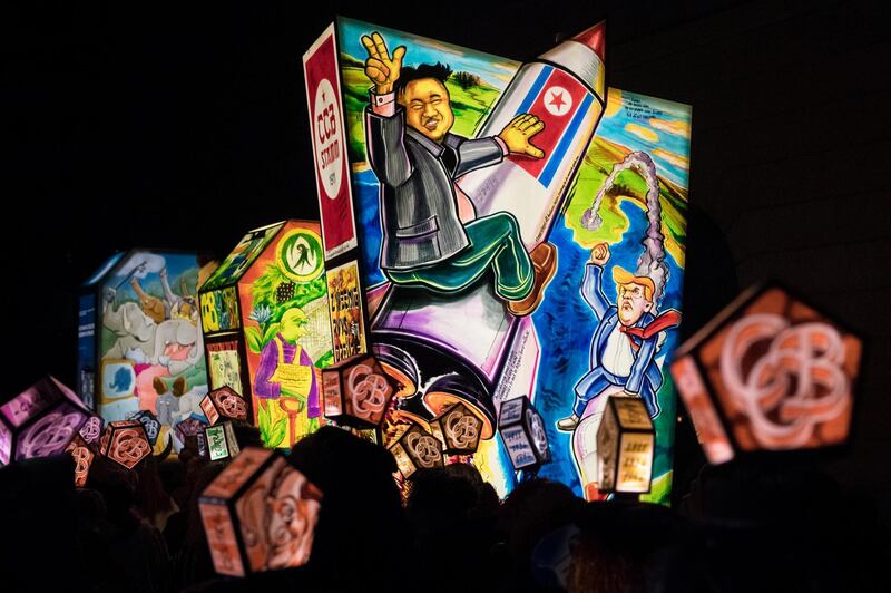 Lanterns are paraded through the streets during the Morgestraich carnival in Basel, Switzerland.  Ennio Leanza / EPA