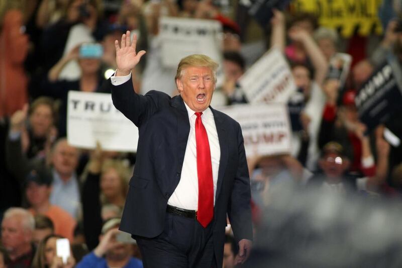 Republican presidential candidate Donald Trump waves during a campaign event at the Myrtle Beach Convention Center, in Myrtle Beach, South Carolina. Willis Glassgow / AP Photo