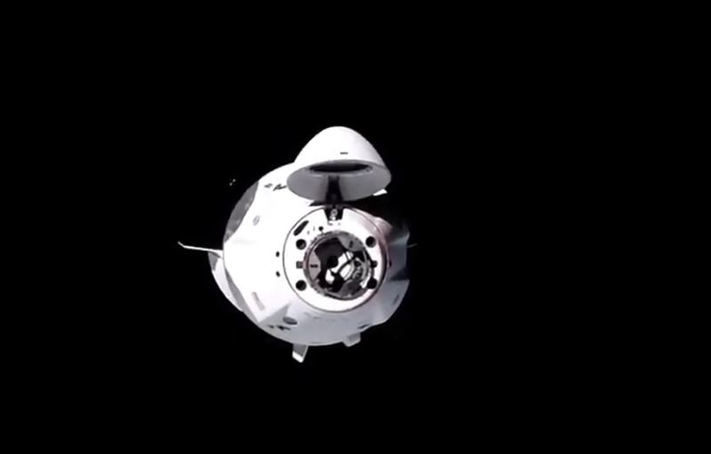 Nasa's SpaceX Crew-1 mission aboard the SpaceX Crew Dragon approaches the International Space Station. Nasa TV / AFP