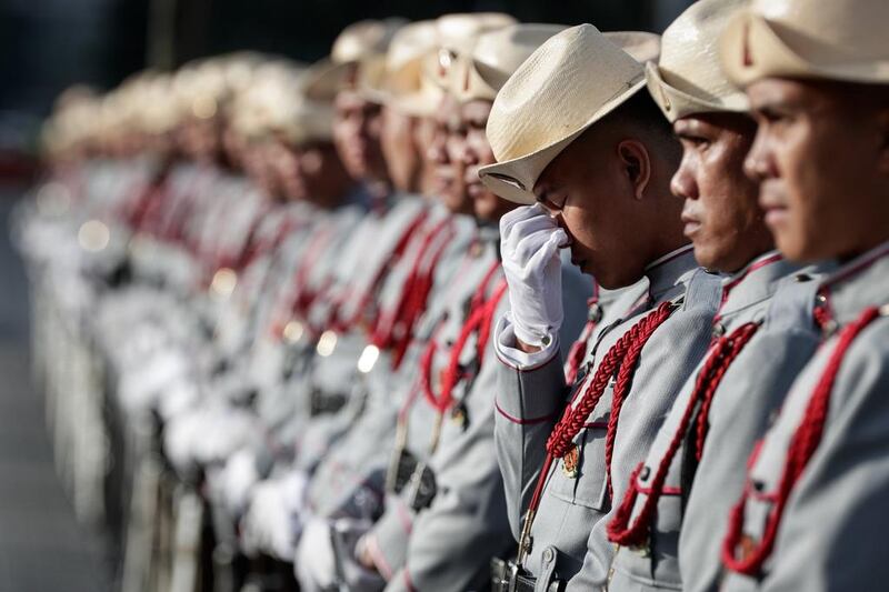 A Filipino serviceman reacts during an Independence Day ceremony at Luneta Park in Manila. Mark R Cristino / EPA