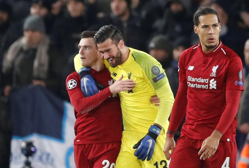 Soccer Football - Champions League - Group Stage - Group C - Liverpool v Napoli - Anfield, Liverpool, Britain - December 11, 2018  Liverpool's Alisson celebrates with Andrew Robertson at the end of the match   Action Images via Reuters/Carl Recine