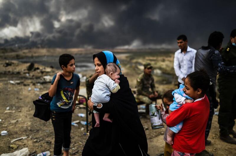 Thousands of people have been displaced by the ongoing operation against ISIL. Bulent Kilik / AFP