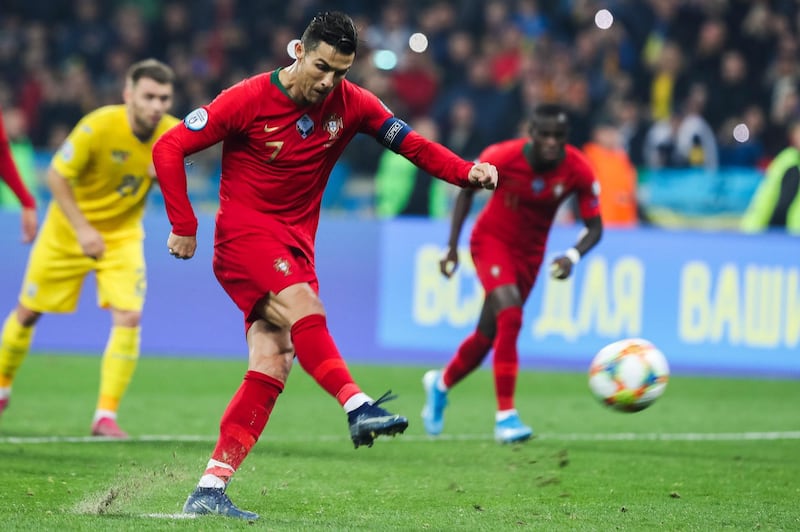 Portugal`s Cristiano Ronaldo scores from the spot against Ukraine in a Euro 2020 qualifier, in Kiev, on Monday, 14 October 2019. It was his 700th career goal. EPA
