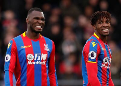 Soccer Football - Premier League - Crystal Palace vs Newcastle United - Selhurst Park, London, Britain - February 4, 2018   Crystal Palace's Christian Benteke and Wilfried Zaha react             REUTERS/David Klein    EDITORIAL USE ONLY. No use with unauthorized audio, video, data, fixture lists, club/league logos or "live" services. Online in-match use limited to 75 images, no video emulation. No use in betting, games or single club/league/player publications.  Please contact your account representative for further details.