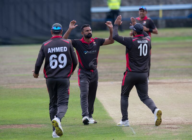 Kashif Daud celebrates after taking the wicket of Craig Wallace. 