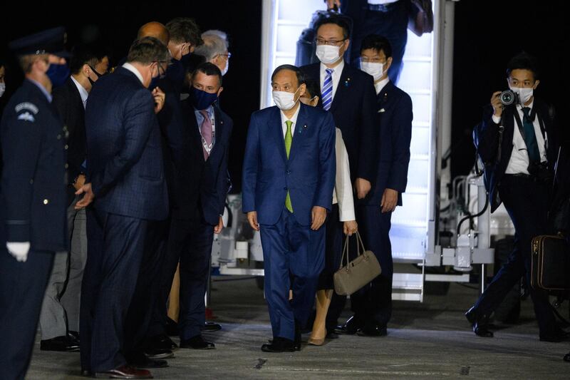 Japan's Prime Minister Yoshihide Suga arrives. Reuters
