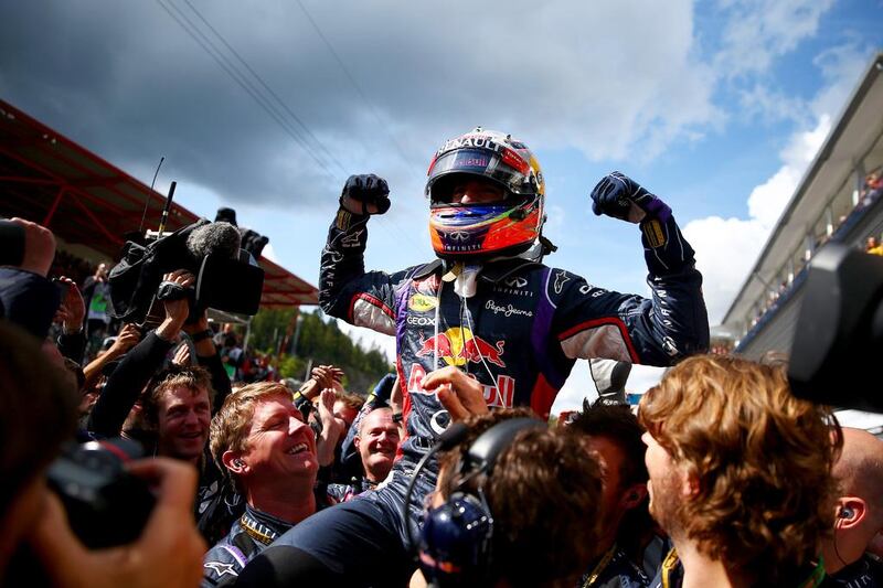 Daniel Ricciardo of Australia and Infiniti Red Bull Racing celebrates in Parc Ferme after winning the Belgian Grand Prix at Circuit de Spa-Francorchamps on August 24, 2014.  Dan Istitene / Getty Images