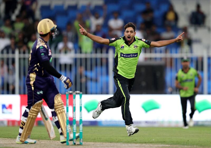 Sharjah, United Arab Emirates - February 23, 2019:  Lahore's Haris Rauf takes the wicked of Quetta's Umar Akmal during the game between Lahore Qalandars and Quetta Gladiators in the Pakistan Super League. Saturday the 23rd of February 2019 at Sharjah Cricket Stadium, Sharjah. Chris Whiteoak / The National