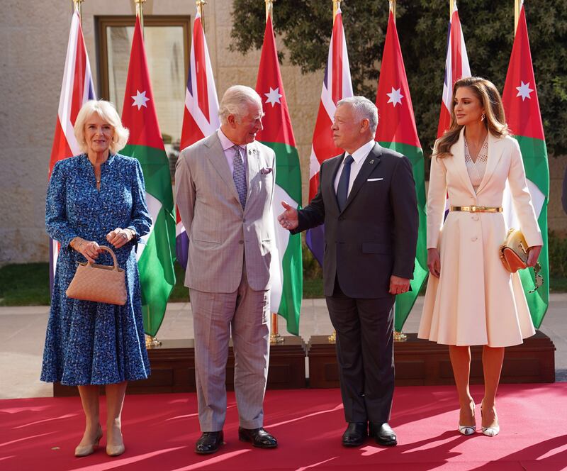 A handout photo made available by the Jordanian Royal Palace shows Britain's Prince Charles, Prince of Wales (2-L), and his wife Camilla, the Duchess of Cornwall (L), being welcomed by Jordan's King Abdullah II (2-R) and Queen Rania Al Abdullah (R), in Amman, Jordan, 16 November 2021.   EPA / JORDANIAN ROYAL PALACE HANDOUT  HANDOUT EDITORIAL USE ONLY / NO SALES