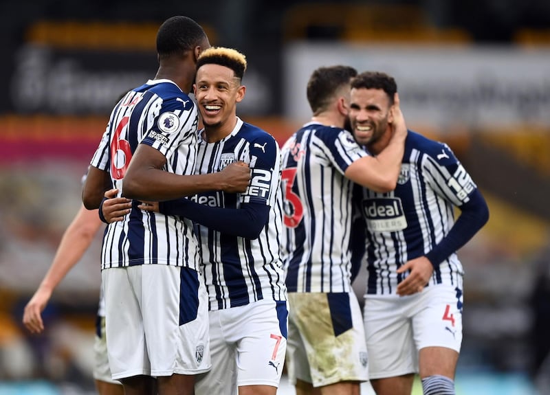 West Bromwich Albion players celebrate after the final whistle. PA