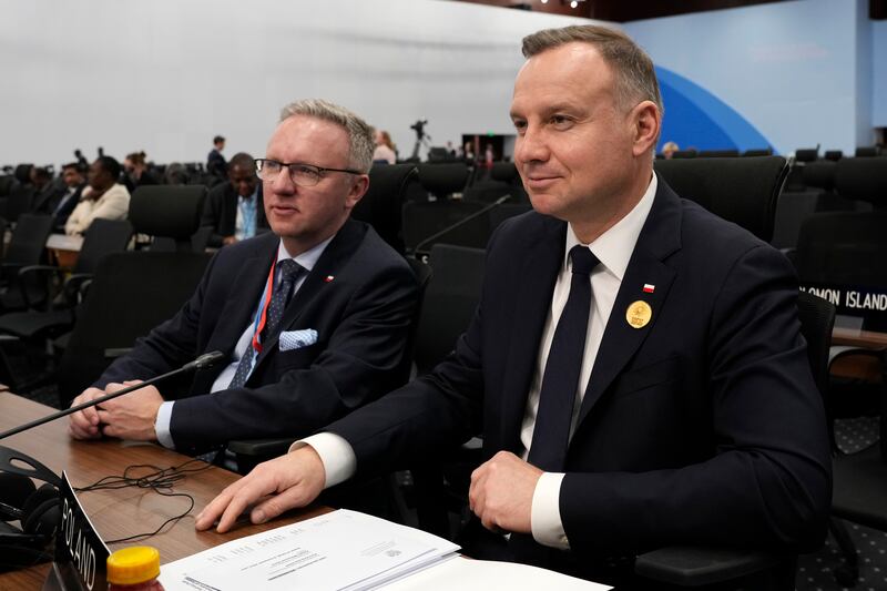 Polish President Andrzej Duda, right, before speaking at the Cop27 UN Climate Summit.  AP Photo