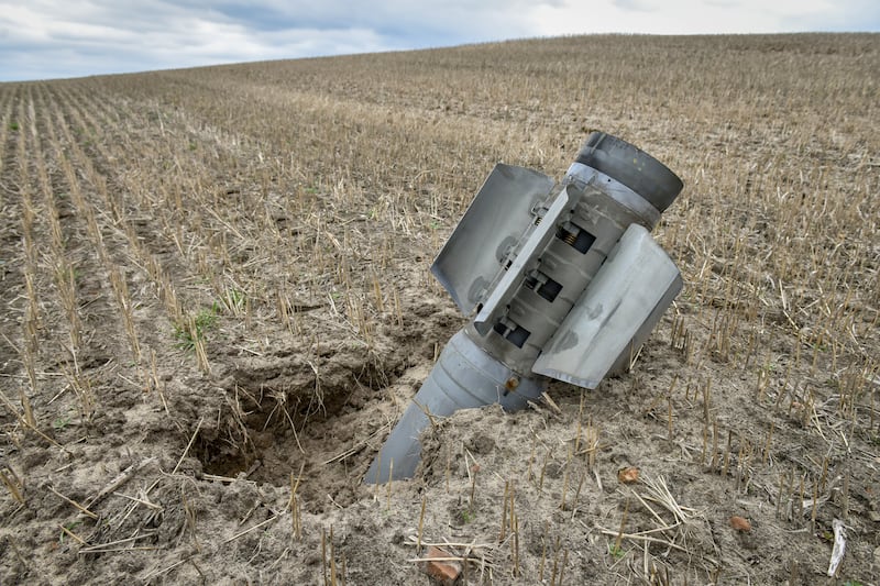 Debris of a rocket missile on the field near Kyiv. EPA