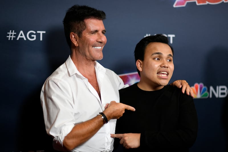 'America's Got Talent' judge Simon Cowell with the 2019 winner Kodi Lee. AFP