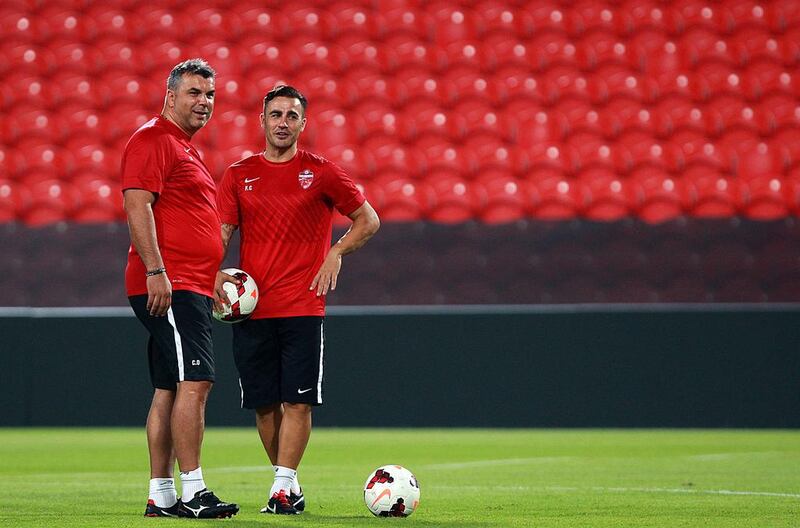 In Cosmin Olaroiu, left, and Fabio Cannavaro, Al Ahli have the best backroom staff in the UAE. Satish Kumar / The National