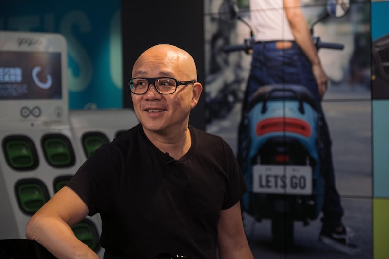 Horace Luke, founder and chief executive officer of Gogoro Inc., speaks during a Bloomberg Television interview at Bade Guanghua store in Taipei, Taiwan, on Tuesday, Jan. 23, 2018. Gogoro, the Taiwanese electric scooter maker backed by former U.S. Vice President Al Gore, sees the smog-choked streets of Southeast Asia as the ideal target market as it embarks on a quest to expand its business overseas. Photographer: Billy H.C. Kwok/Bloomberg