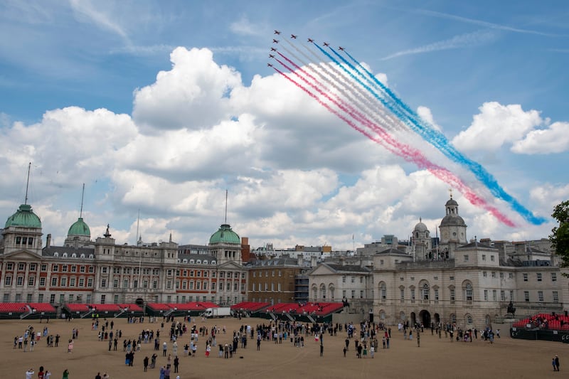 The Red Arrows perform a flypast over the Horse Guards parade, London. Trooping The Colour is a military ceremony performed by regiments of the British Army. It has taken place since the mid-17th century. Getty Images