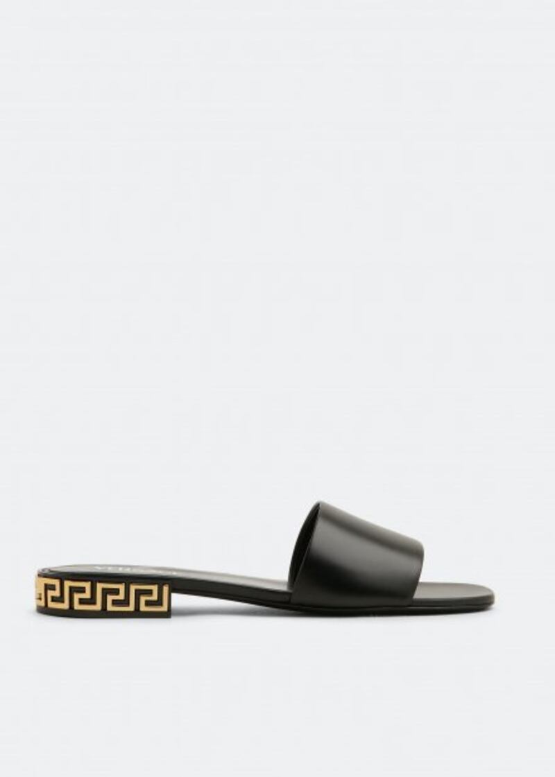 Greca Mules, Dh2,950, Versace, Level Shoes. Photo: Level Shoes