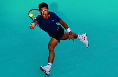 South Korea's Hyeon Chung plays the ball to South Africa’s Kevin Anderson during the 2018 Mubadala World Tennis Championship match in Abu Dhabi, on December 27, 2018. 
 / AFP / GIUSEPPE CACACE
