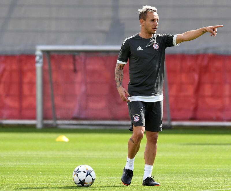 Bayern Munich's Rafinha gestures during a training session. Christof Stache / AFP