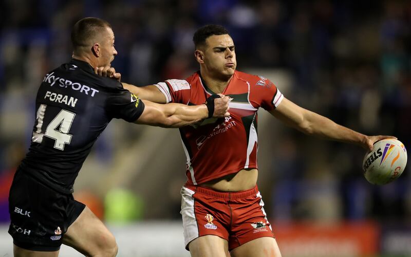 James Roumanos of Lebanon is tackled by Kieran Foran of New Zealand during the match. Getty Images 