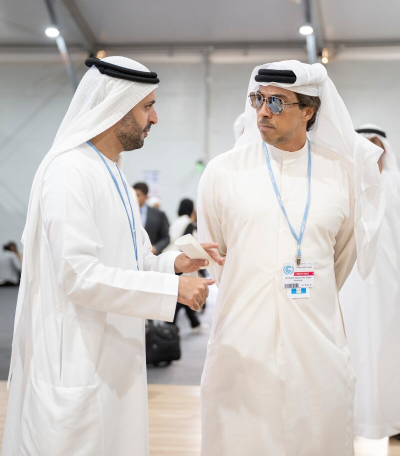 Sheikh Mansour, right, and Sheikh Mohamed bin Hamad, private affairs adviser for the Presidential Court. Rashed Al Mansoori / UAE Presidential Court 