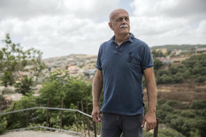 Retired Israeli Brig. Gen. Amal Asad as he walks near his home in Isfiya, a Druze-majority town in northern Israel in the region of  Mount Carmel. 
Last August Asad called Israel an 'apartheid state' over the Nationality Law in a Facebook post. (Photo by Heidi Levine for The National).