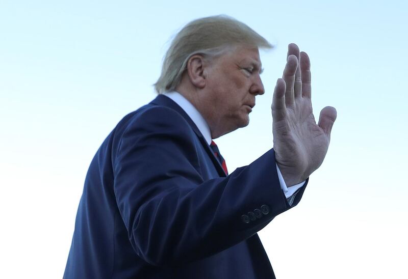 U.S. President Donald Trump waves to reporters prior to departing Washington for travel to Chicago at Joint Base Andrews, Maryland, U.S., October 28, 2019. REUTERS/Leah Millis