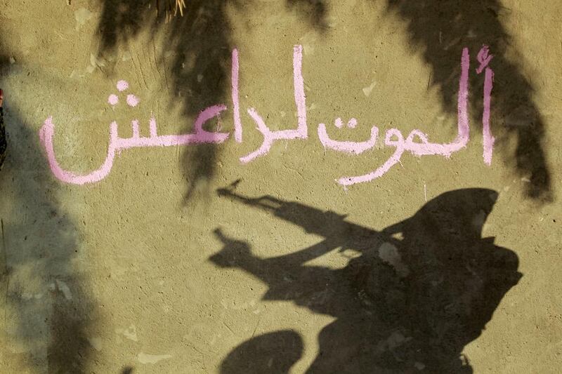 Graffiti near the Shiite shrine city of Karbala in Iraq, seen in this picture from 2017, reads "Death to Islamic State". Sleeper cells of the group continue to carry out sporadic attacks in the country. AFP