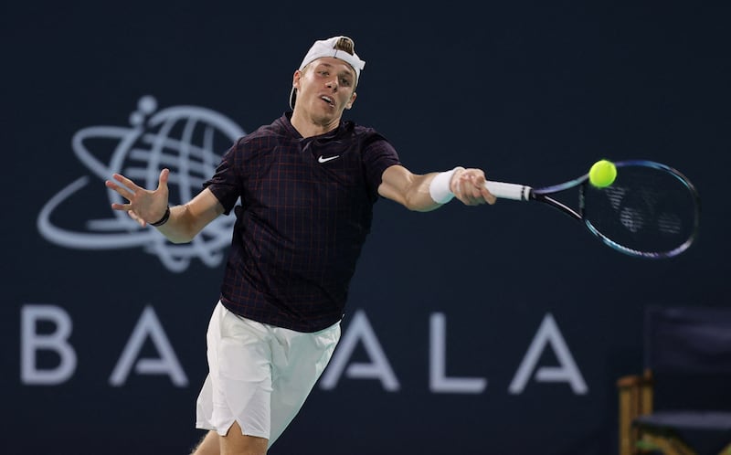 Denis Shapovalov hits a forehand to Andrey Rublev. Reuters