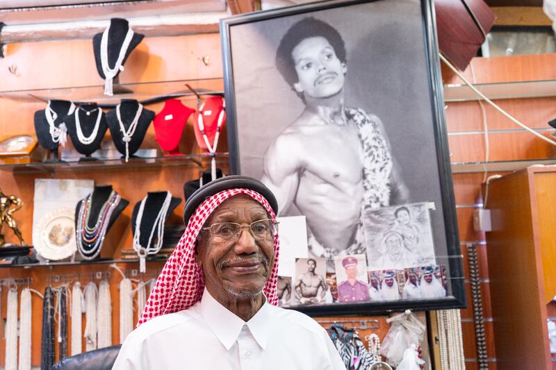 Saad Ismail Al Jassem, among the oldest pearl divers in Qatar, stands by his shop. Ola Stefatou/ The National 