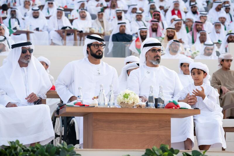 AL WATHBA, ABU DHABI, UNITED ARAB EMIRATES - December 03, 2019: (L-R) Rear Admiral Pilot HH Sheikh Saeed bin Hamdan bin Mohamed Al Nahyan, Commander of the UAE Naval Forces, HH Sheikh Zayed bin Hamdan bin Zayed Al Nahyan, HH Major General Sheikh Khaled bin Mohamed bin Zayed Al Nahyan, Deputy National Security Adviser, member of the Abu Dhabi Executive Council and Chairman of Abu Dhabi Executive Office and HH Sheikh Mohamed bin Khaled bin Mohamed bin Zayed Al Nahyan, watch the Union March during the Sheikh Zayed Heritage Festival. 

( Hamad Al Kaabi / Ministry of Presidential Affairs )​
---