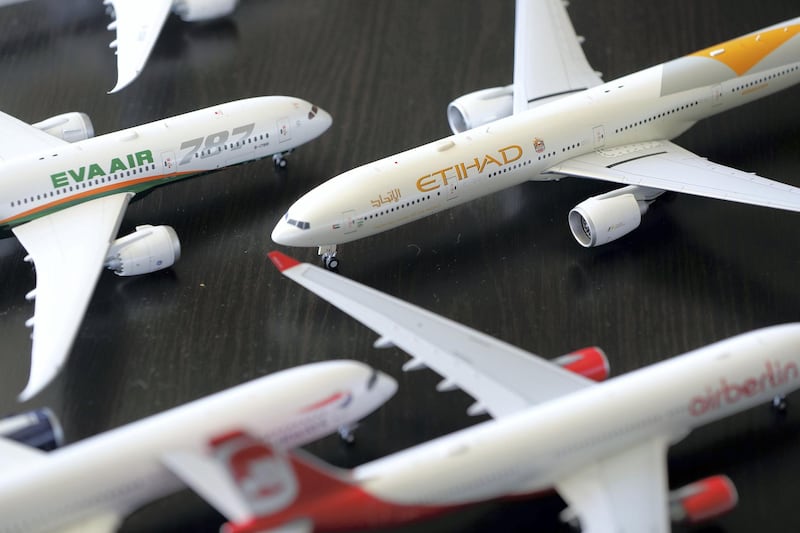 Abu Dhabi, United Arab Emirates - Reporter: Sarwat Nasir: Ben Matar is a pilot for Etihad who owns what he believes to be the UAE's largest collection of model airplanes, which he estimates to be worth $90,000. There are 900 of them. An Etihad 777-300 and Eva air 787. Monday, May 18th, 2020. Abu Dhabi. Chris Whiteoak / The National