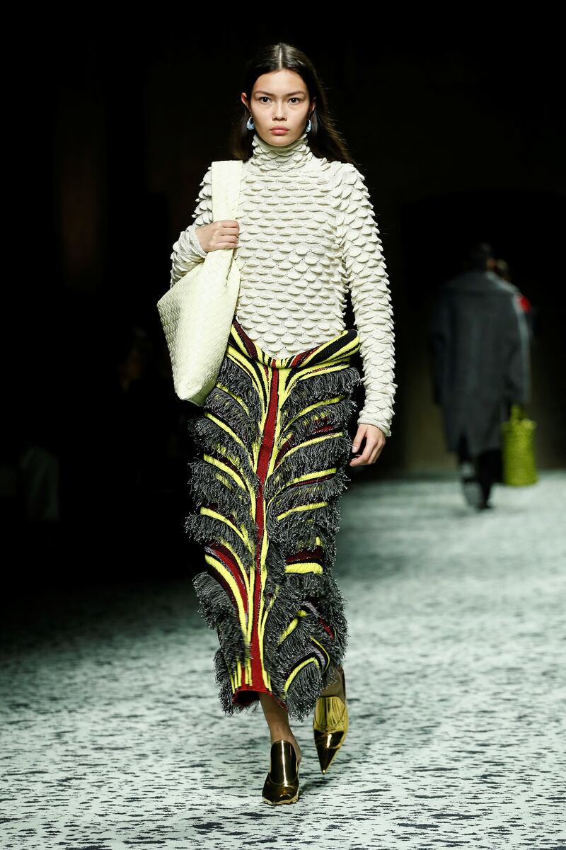 A crocheted top over a skirt with wool fringing at Bottega Veneta. Reuters 