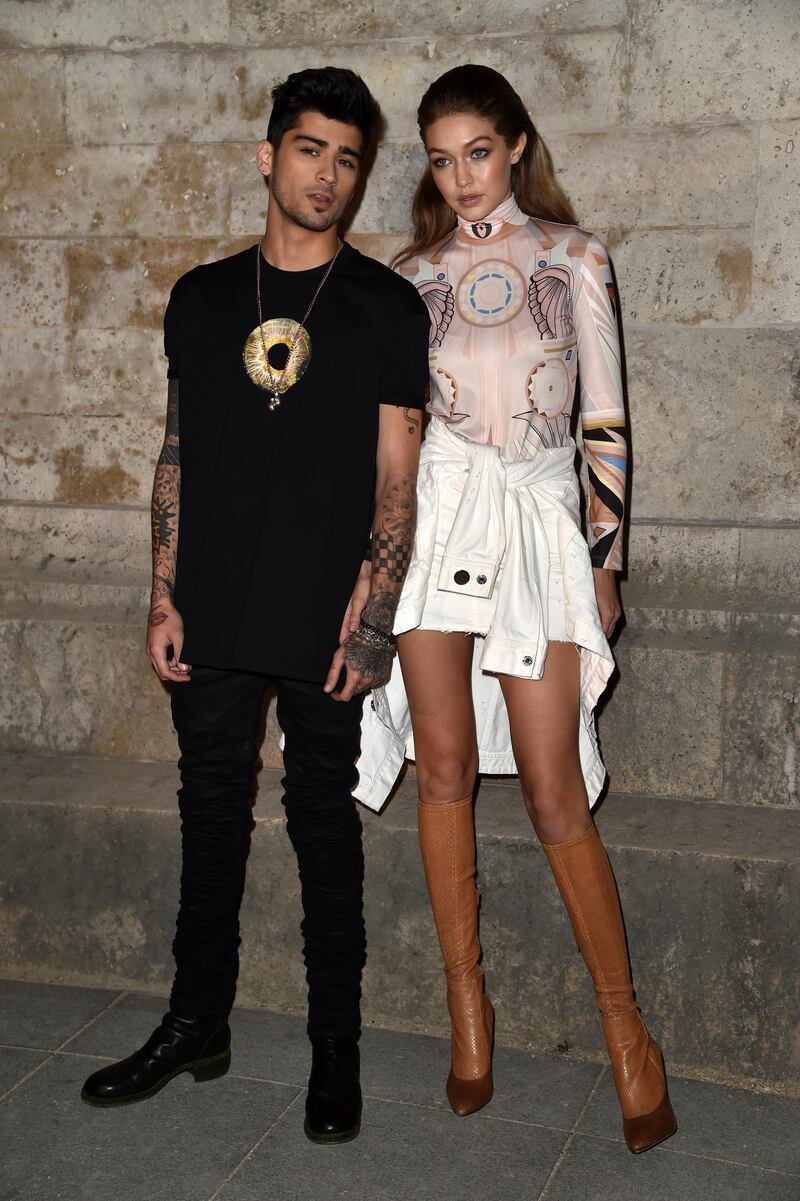 PARIS, FRANCE - OCTOBER 02:  Zayn Malik and Gigi Hadid attend the Givenchy show as part of the Paris Fashion Week Womenswear  Spring/Summer 2017  on October 2, 2016 in Paris, France.  (Photo by Pascal Le Segretain/Getty Images)