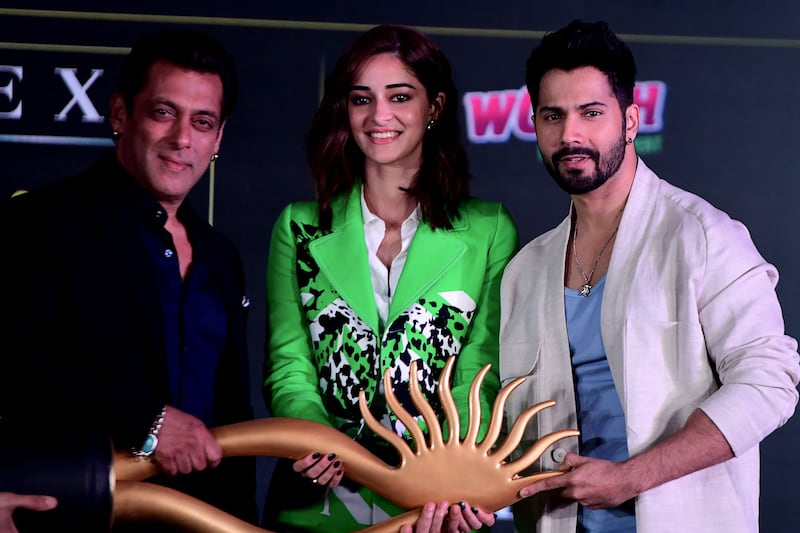 Bollywood actors Salman Khan, left, Ananya Pandey, centre and Varun Dhawan attend the press conference for the 22nd edition of the International Indian Film Academy (IIFA) Weekend and Awards, in Mumbai on March 28, 2022. AFP