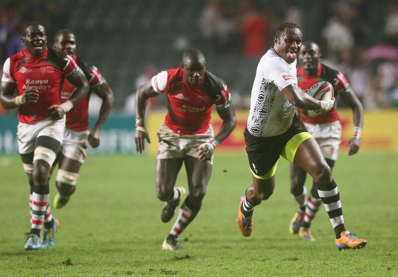 Pio Tuwai, right, led Fiji to the title last year but the expected capacity crowds will not see him in action this weekend. Mark Metcalfe / Getty Images

