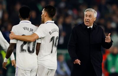Real Madrid coach Carlo Ancelotti, right, remonstrates with Vinicius Junior and Dani Ceballos. Reuters