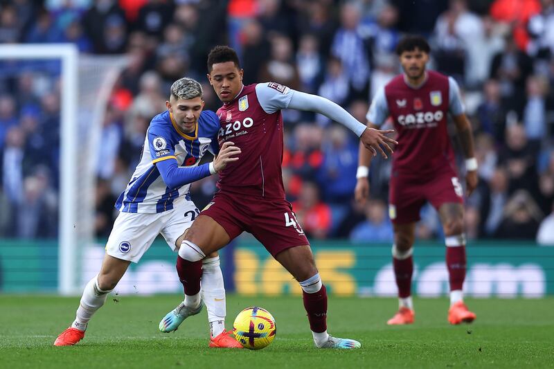 Jacob Ramsey of Aston Villa is challenged by Julio Enciso of Brighton. Getty 