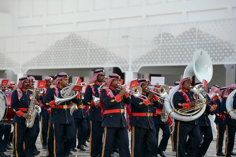 A marching band practises at Sakhir Palace before the arrival of Pope Francis. Khushnum Bhandari / The National