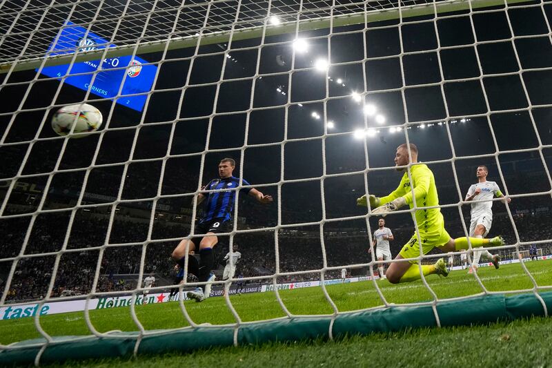 Edin Dzeko scores Inter's second goal past Plzen goalkeeper Jindrich Stanek. AP